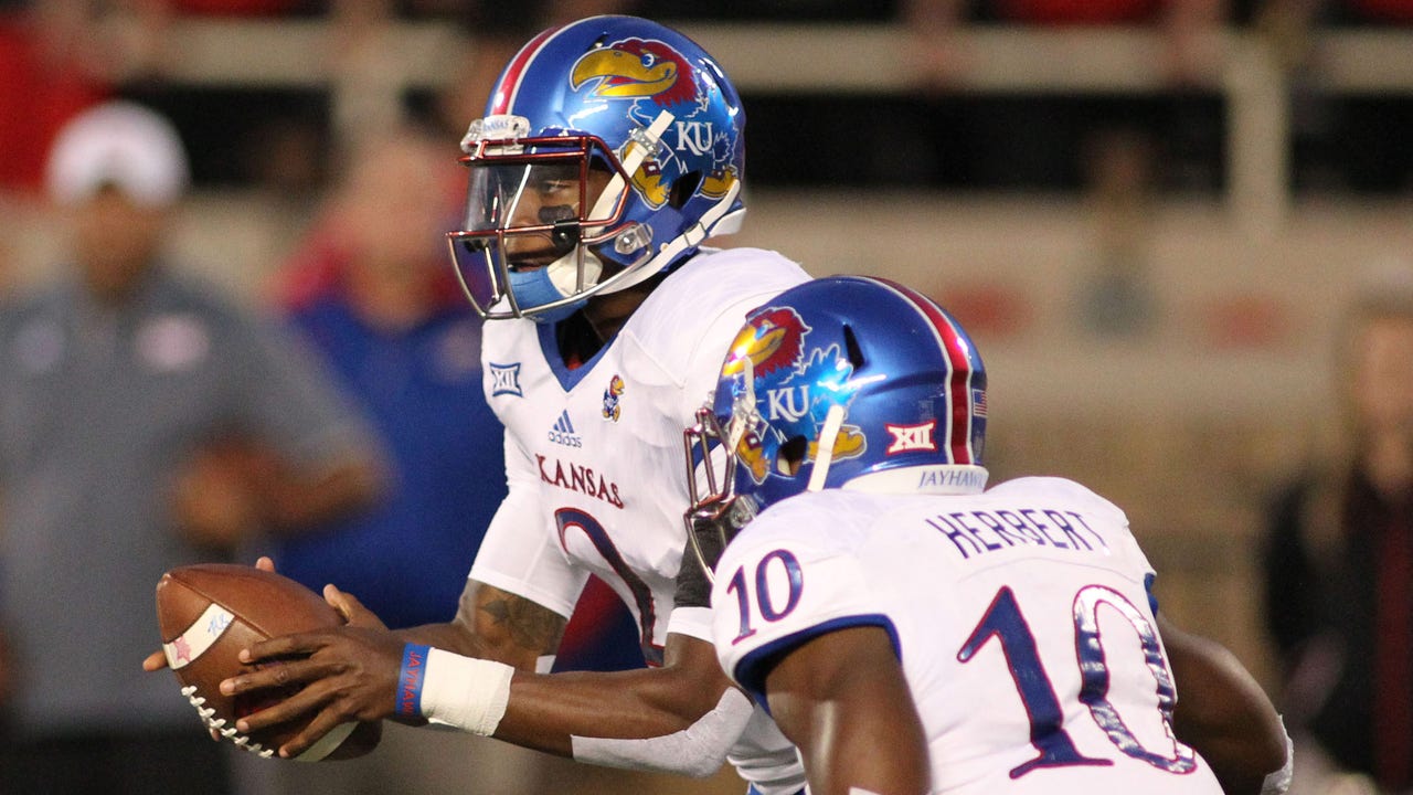 Jayhawks routed 55-19 by Red Raiders